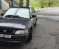 Черный Форд Эскорт, объемом двигателя 1.8 л и пробегом 67 тыс. км за 1800 $, фото 2 на Automoto.ua
