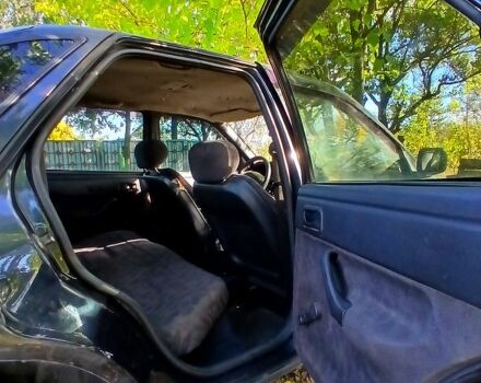 Черный Форд Эскорт, объемом двигателя 1.3 л и пробегом 487 тыс. км за 650 $, фото 6 на Automoto.ua