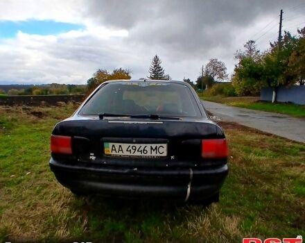 Черный Форд Эскорт, объемом двигателя 1.3 л и пробегом 487 тыс. км за 650 $, фото 3 на Automoto.ua