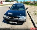 Черный Форд Эскорт, объемом двигателя 1.6 л и пробегом 130 тыс. км за 750 $, фото 1 на Automoto.ua