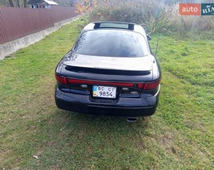 Черный Форд Эскорт, объемом двигателя 2 л и пробегом 147 тыс. км за 2000 $, фото 6 на Automoto.ua