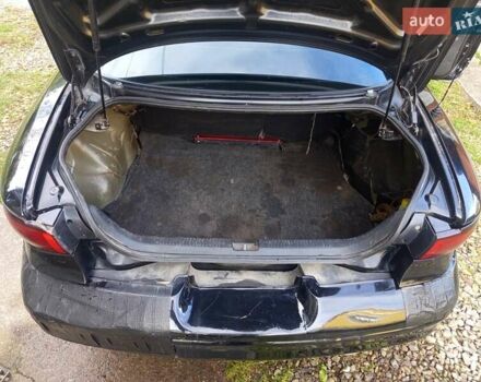 Черный Форд Эскорт, объемом двигателя 2 л и пробегом 147 тыс. км за 2000 $, фото 10 на Automoto.ua