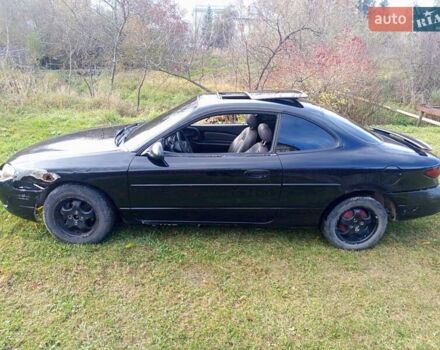 Черный Форд Эскорт, объемом двигателя 2 л и пробегом 147 тыс. км за 2000 $, фото 2 на Automoto.ua