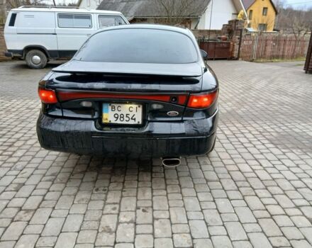 Черный Форд Эскорт, объемом двигателя 2 л и пробегом 149 тыс. км за 2200 $, фото 4 на Automoto.ua