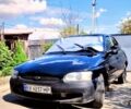 Черный Форд Эскорт, объемом двигателя 1.6 л и пробегом 180 тыс. км за 1500 $, фото 1 на Automoto.ua