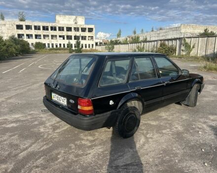 Черный Форд Эскорт, объемом двигателя 1.4 л и пробегом 330 тыс. км за 750 $, фото 4 на Automoto.ua