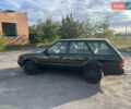 Черный Форд Эскорт, объемом двигателя 1.4 л и пробегом 330 тыс. км за 750 $, фото 1 на Automoto.ua