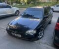 Черный Форд Эскорт, объемом двигателя 1.6 л и пробегом 330 тыс. км за 602 $, фото 1 на Automoto.ua