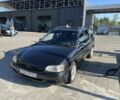 Черный Форд Эскорт, объемом двигателя 1.6 л и пробегом 330 тыс. км за 601 $, фото 1 на Automoto.ua
