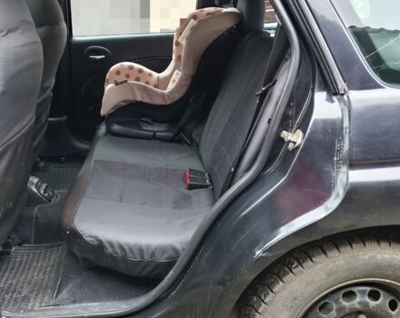 Черный Форд Эскорт, объемом двигателя 1.8 л и пробегом 65 тыс. км за 1800 $, фото 5 на Automoto.ua