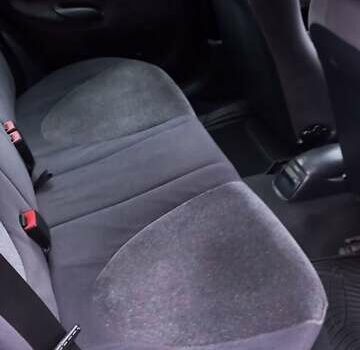 Черный Форд Эскорт, объемом двигателя 1.6 л и пробегом 349 тыс. км за 2000 $, фото 1 на Automoto.ua