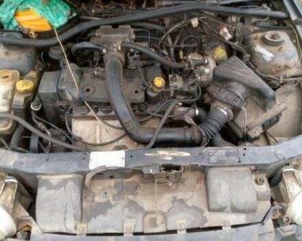 Черный Форд Эскорт, объемом двигателя 1.4 л и пробегом 200 тыс. км за 700 $, фото 2 на Automoto.ua