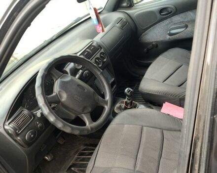 Чорний Форд Ескорт, об'ємом двигуна 1.8 л та пробігом 390 тис. км за 1550 $, фото 4 на Automoto.ua