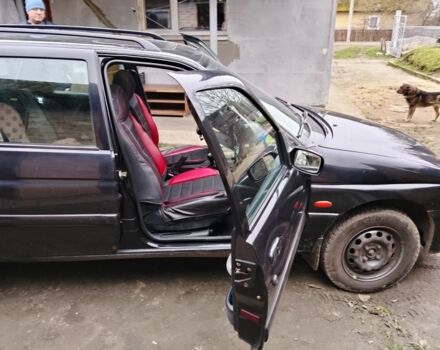 Черный Форд Эскорт, объемом двигателя 1.8 л и пробегом 65 тыс. км за 1800 $, фото 6 на Automoto.ua