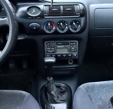 Черный Форд Эскорт, объемом двигателя 1.6 л и пробегом 349 тыс. км за 2000 $, фото 2 на Automoto.ua