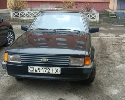 Черный Форд Эскорт, объемом двигателя 1.3 л и пробегом 200 тыс. км за 593 $, фото 1 на Automoto.ua