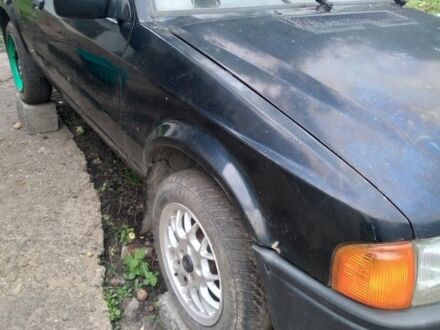 Черный Форд Эскорт, объемом двигателя 1 л и пробегом 185 тыс. км за 900 $, фото 1 на Automoto.ua