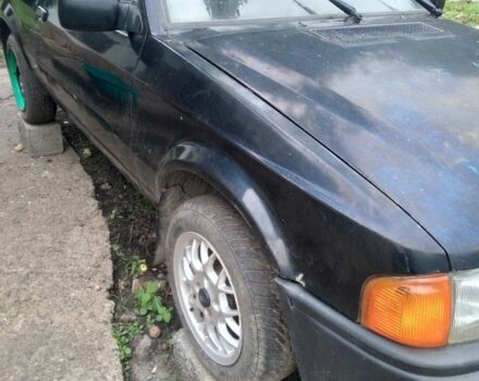 Черный Форд Эскорт, объемом двигателя 1 л и пробегом 185 тыс. км за 900 $, фото 1 на Automoto.ua