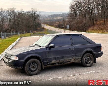 Чорний Форд Ескорт, об'ємом двигуна 1.3 л та пробігом 300 тис. км за 1000 $, фото 1 на Automoto.ua
