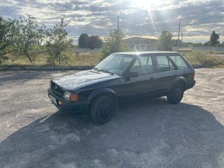 Форд Эскорт 1989 в Сарнах на Automoto.ua Черный Форд Эскорт, объемом двигателя 1.4 л и пробегом 330 тыс. км за 750 $, фото 1 на Automoto.ua