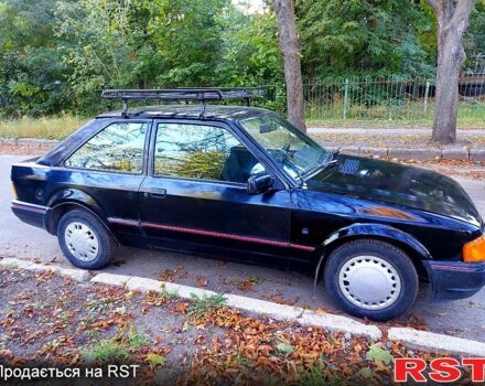 Черный Форд Эскорт, объемом двигателя 1.6 л и пробегом 230 тыс. км за 500 $, фото 1 на Automoto.ua