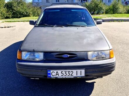 Черный Форд Эскорт, объемом двигателя 1.9 л и пробегом 333 тыс. км за 1350 $, фото 1 на Automoto.ua
