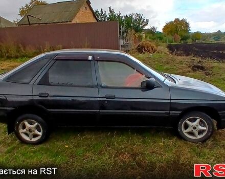 Черный Форд Эскорт, объемом двигателя 1.3 л и пробегом 487 тыс. км за 650 $, фото 1 на Automoto.ua