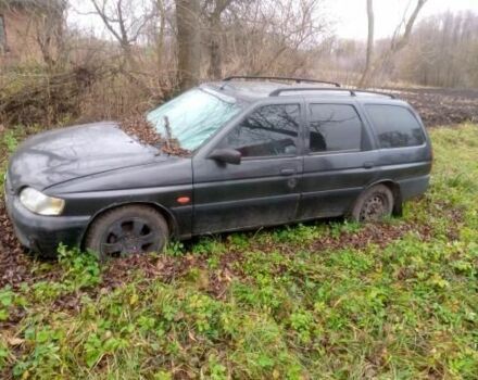 Черный Форд Эскорт, объемом двигателя 1.4 л и пробегом 200 тыс. км за 700 $, фото 1 на Automoto.ua