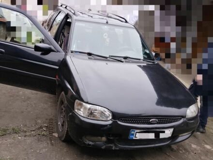 Черный Форд Эскорт, объемом двигателя 1.8 л и пробегом 65 тыс. км за 1800 $, фото 1 на Automoto.ua