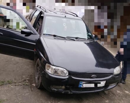 Черный Форд Эскорт, объемом двигателя 1.8 л и пробегом 65 тыс. км за 1800 $, фото 1 на Automoto.ua