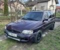 Фіолетовий Форд Ескорт, об'ємом двигуна 1.4 л та пробігом 300 тис. км за 600 $, фото 1 на Automoto.ua