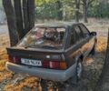 Коричневий Форд Ескорт, об'ємом двигуна 1.4 л та пробігом 100 тис. км за 1100 $, фото 1 на Automoto.ua