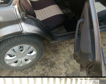 Коричневый Форд Эскорт, объемом двигателя 1.4 л и пробегом 100 тыс. км за 800 $, фото 7 на Automoto.ua