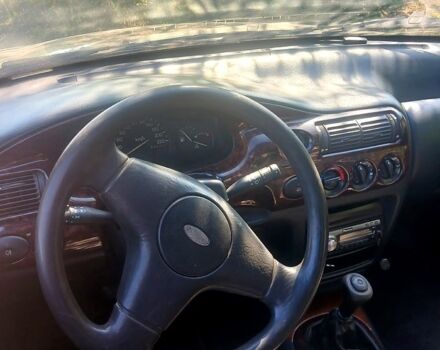 Коричневый Форд Эскорт, объемом двигателя 1.3 л и пробегом 0 тыс. км за 1550 $, фото 1 на Automoto.ua