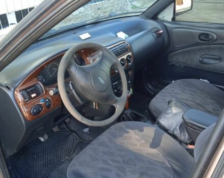 Коричневый Форд Эскорт, объемом двигателя 1.6 л и пробегом 87 тыс. км за 1700 $, фото 3 на Automoto.ua