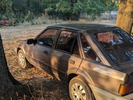 Форд Ескорт 1986 у Черняхове на Automoto.ua Коричневий Форд Ескорт, об'ємом двигуна 1.4 л та пробігом 100 тис. км за 1100 $, фото 1 на Automoto.ua