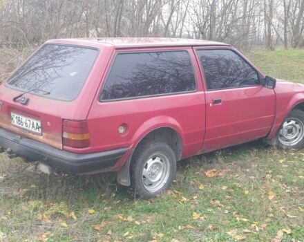 Красный Форд Эскорт, объемом двигателя 1.3 л и пробегом 165 тыс. км за 550 $, фото 4 на Automoto.ua