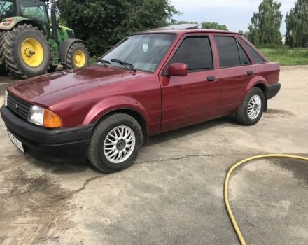 Красный Форд Эскорт, объемом двигателя 1.3 л и пробегом 180 тыс. км за 1550 $, фото 1 на Automoto.ua