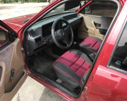 Красный Форд Эскорт, объемом двигателя 1.3 л и пробегом 180 тыс. км за 1550 $, фото 4 на Automoto.ua