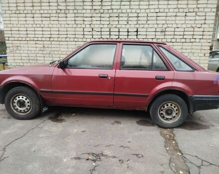 Красный Форд Эскорт, объемом двигателя 1.6 л и пробегом 300 тыс. км за 750 $, фото 1 на Automoto.ua