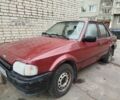 Красный Форд Эскорт, объемом двигателя 1.6 л и пробегом 300 тыс. км за 750 $, фото 1 на Automoto.ua