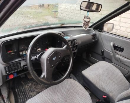 Красный Форд Эскорт, объемом двигателя 1.6 л и пробегом 300 тыс. км за 750 $, фото 7 на Automoto.ua