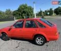 Красный Форд Эскорт, объемом двигателя 1.4 л и пробегом 80 тыс. км за 800 $, фото 2 на Automoto.ua