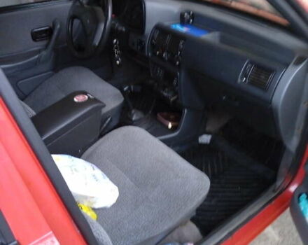 Красный Форд Эскорт, объемом двигателя 1.4 л и пробегом 201 тыс. км за 1600 $, фото 1 на Automoto.ua