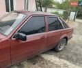 Красный Форд Эскорт, объемом двигателя 1.6 л и пробегом 100 тыс. км за 700 $, фото 1 на Automoto.ua