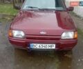 Красный Форд Эскорт, объемом двигателя 1.6 л и пробегом 230 тыс. км за 1000 $, фото 1 на Automoto.ua