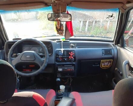 Красный Форд Эскорт, объемом двигателя 1.4 л и пробегом 400 тыс. км за 1300 $, фото 3 на Automoto.ua