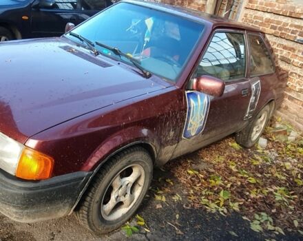 Красный Форд Эскорт, объемом двигателя 1.4 л и пробегом 400 тыс. км за 1300 $, фото 5 на Automoto.ua