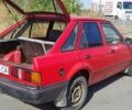 Красный Форд Эскорт, объемом двигателя 1.4 л и пробегом 150 тыс. км за 1200 $, фото 1 на Automoto.ua