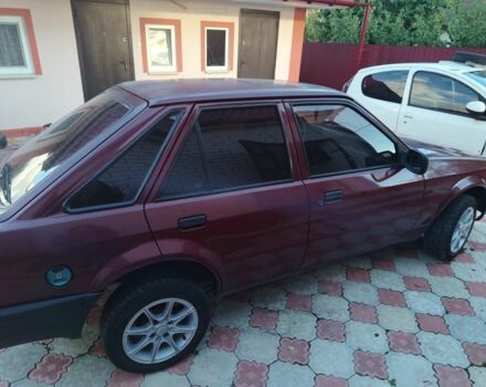Червоний Форд Ескорт, об'ємом двигуна 1.4 л та пробігом 230 тис. км за 900 $, фото 3 на Automoto.ua